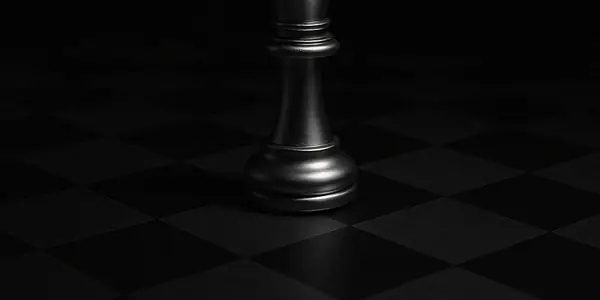 Chess piece on a dark board